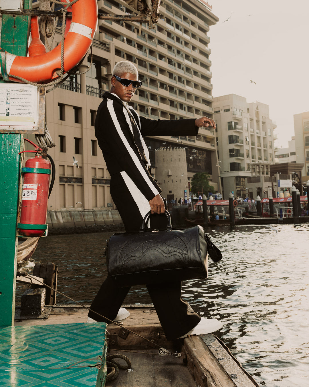 GOLD BRICK DRIP DUFFLE